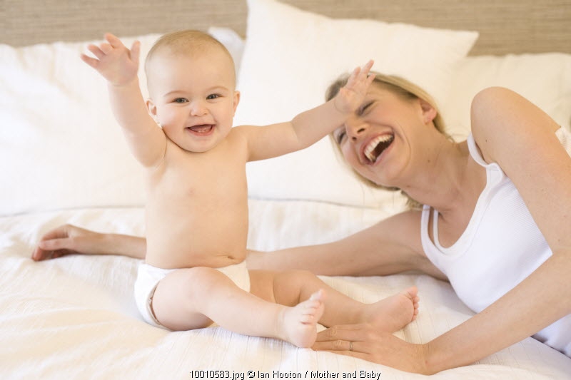 Alasan Bayi Tersenyum