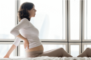 Tips Meredakan Nyeri Punggung saat Hamil